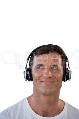 Smiling mature man wearing headphones looking away