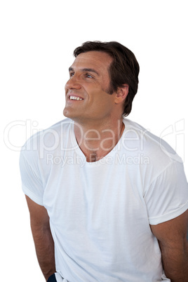 Thoughtful smiling mature man looking away