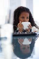 Close up of businesswoman looking away while having coffee