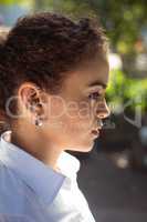 Waitress with ears piercing looking away