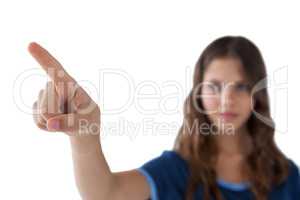Girl pressing an invisible virtual screen