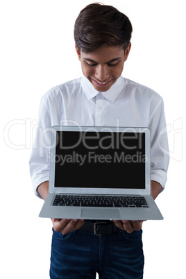 Boy holding laptop