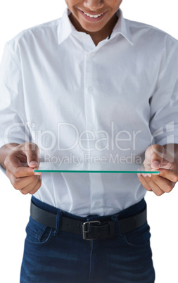 Teenage boy holding a glass digital tablet