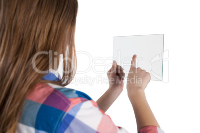 Girl using a glass digital tablet against white background