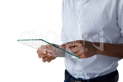 Teenage boy using a glass digital tablet