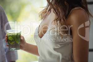 Woman holding a cocktail glass in restaurant