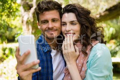 Couple taking selfie from mobile phone