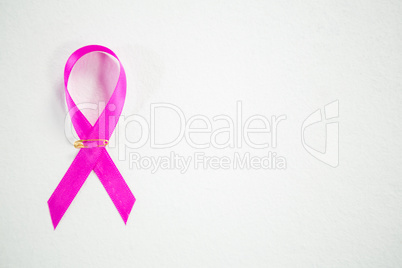 Overhead view of pink Breast Cancer Awareness ribbon