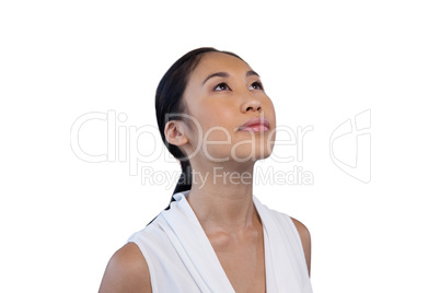 Close up of thoughtful businesswoman looking up