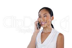 Happy businesswoman talking on mobile phone