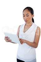 Young businesswoman using digital tablet