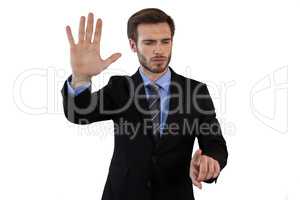 Businessman in suit using invisible interface