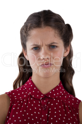 Teenage girl standing against white background