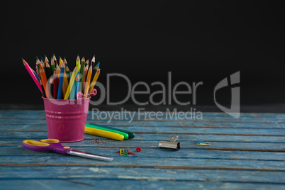 Various school supplies on wooden table