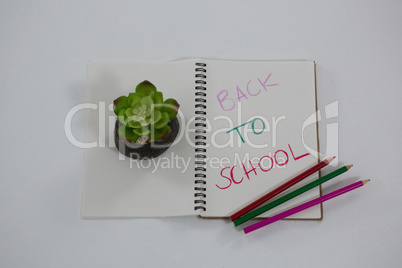 Back to school text written on spiral book