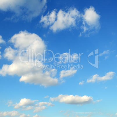 cumulus clouds in the blue sky