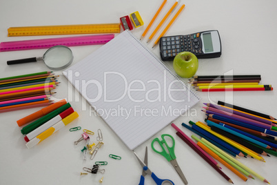 Various school supplies arranged on white background