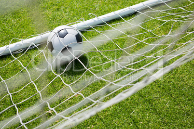 High angle view of soccer ball in goal post