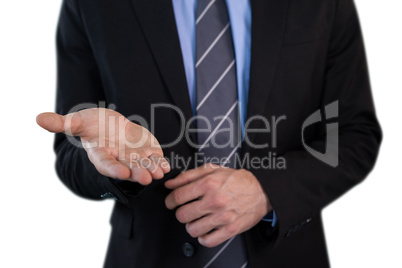Mid section of businessman advertising invisible product