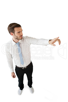 High angle view of businessman touching invisible interface