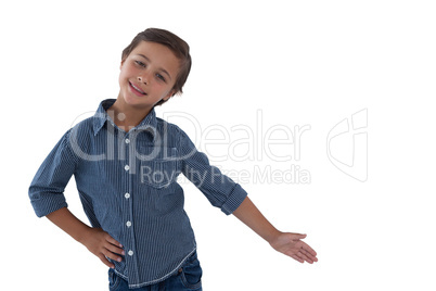 Happy boy posing against white background