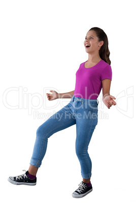 Girl dancing against white background