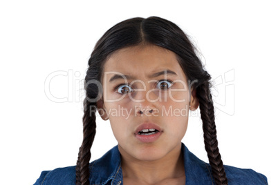 Cute girl surprised against white background