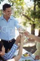 Group of friends toasting champagne glasses