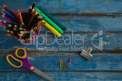 Various school supplies on wooden table