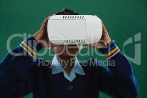 Schoolgirl using virtual reality headset