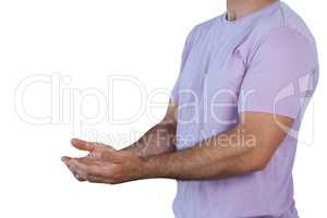 Mid section man with hands cupped holding invisible product
