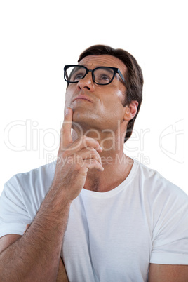 Thoughtful mature man with hand on chin