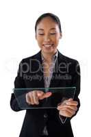 Happy young businesswoman using glass interface