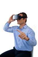 Businessman pointing while wearing virtual reality simulator