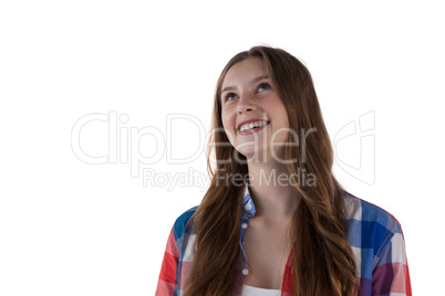 Thoughtful teenager smiling