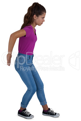 Girl pushing behind against white background