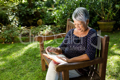 Senior woman reading book