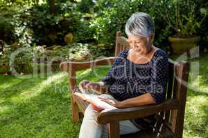 Senior woman reading book