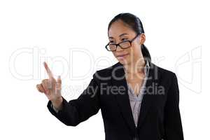 Businesswoman wearing eyeglasses while using invisible interface