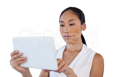 Close up of young businesswoman using tablet computer