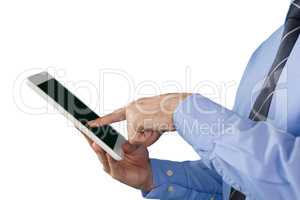 Cropped image of businessman working on tablet computer