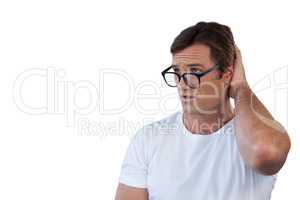 Confused mature man wearing eyeglasses