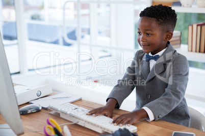 Businessman using computer at desk