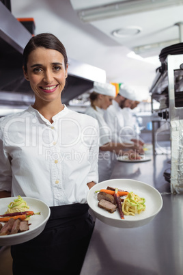 Chef presenting his food plates