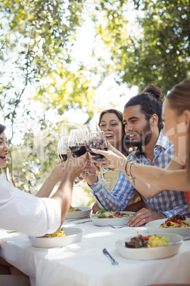 Group of friends toasting champagne glasses