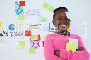 Portrait of smiling businesswoman with adhesive notes
