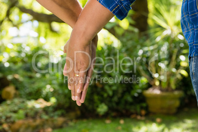 Senior couple holding hands