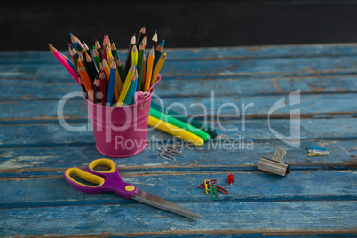 Various school supplies on wooden table