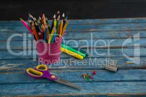 Various school supplies on wooden table