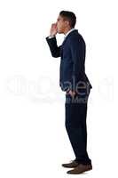 Side view of businessman shouting